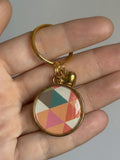 La médaille triangle coloré